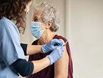 woman receiving vaccine